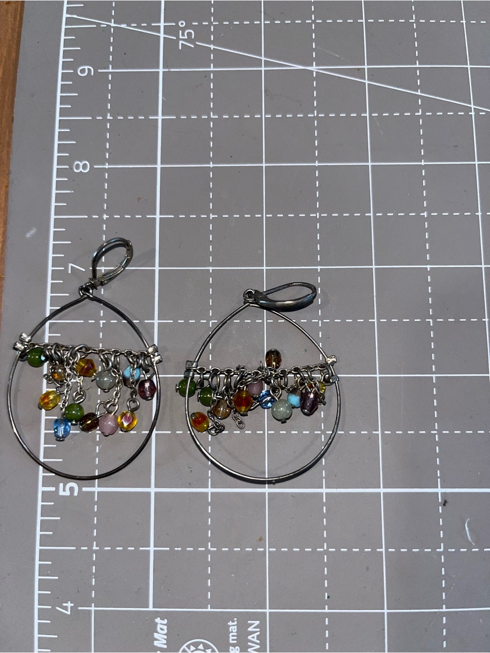 Glass  and metal handmade earrings with fun colors larger hoops dangles fun boho